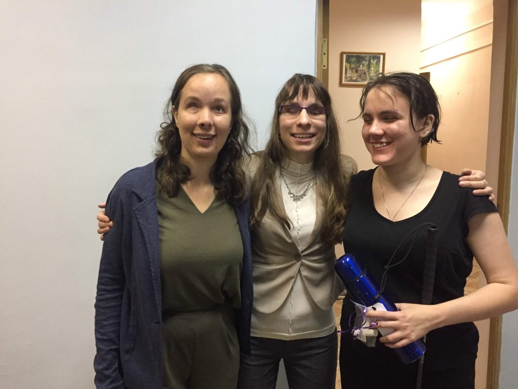 Laurel is standing with Alyona and Oksana, who received technology in 2017 and a cane from us here.