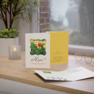 image of the "Hope"" card displayed on a table top, showing the cover, back and interior of the card